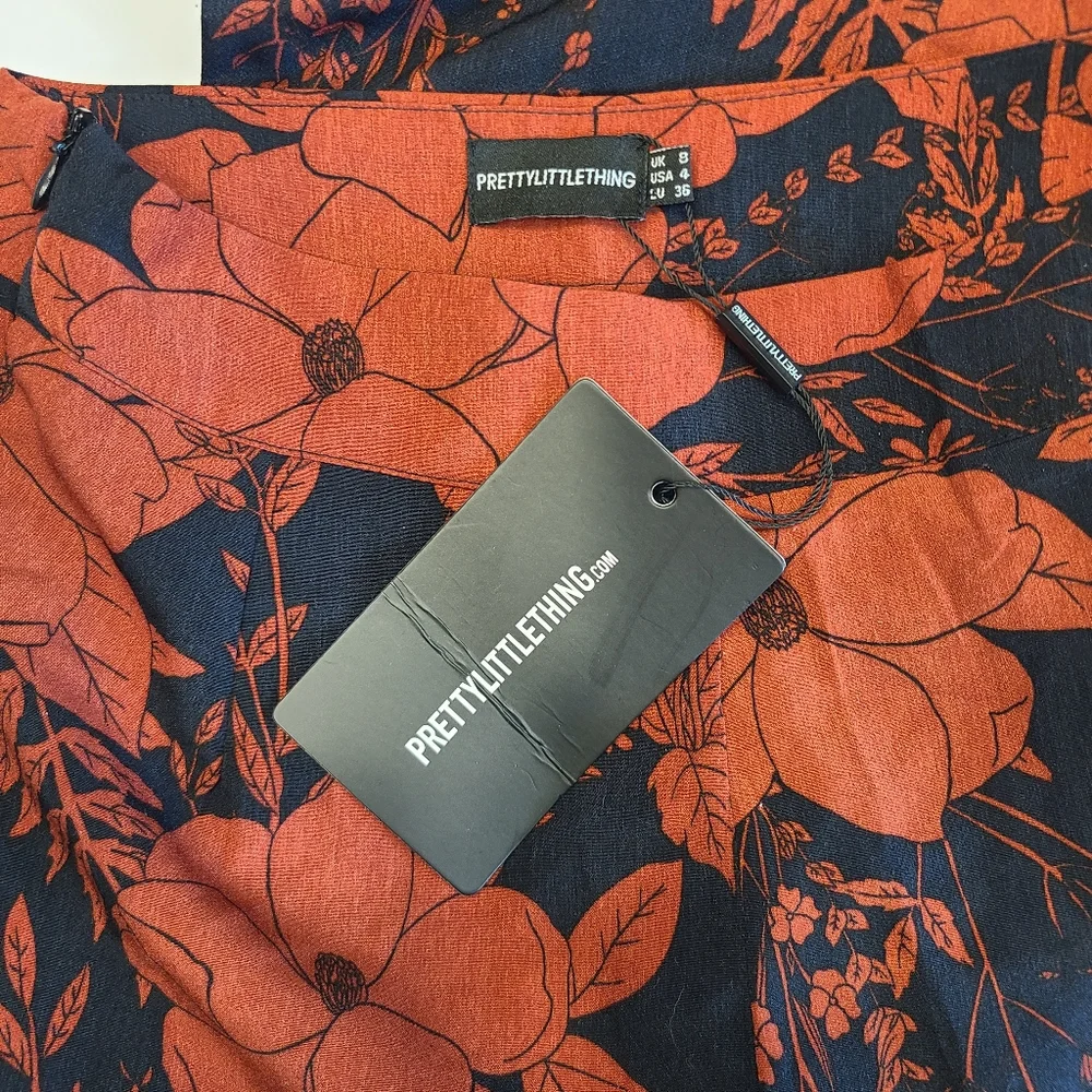PrettyLittleThing Navy Rust Red Tropical Floral Print Flared Wide Leg Pants 4 - Picture 9 of 13